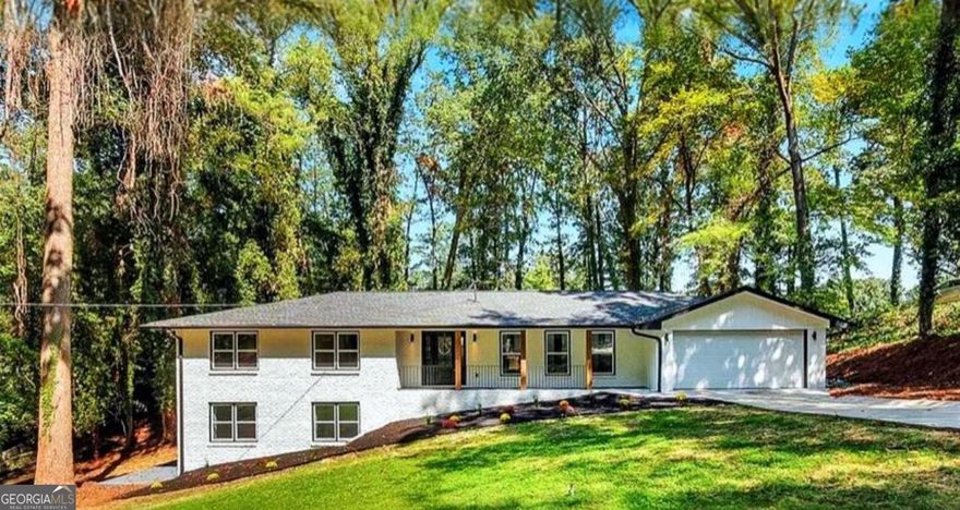 Step into your dream home in the highly sought after Walton school district! This beautifully renovated residence offers an inviting open concept layout, perfect for modern living and entertaining. As you enter, you'll be greeted by a spacious living area that seamlessly flows into a gourmet kitchen, featuring brand new cabinets, elegant quartz countertops, and a luxurious backsplash. Equipped with top-of-the-line stainless steel appliances, this kitchen is a chef's paradise. Throughout the home, enjoy new flooring, fresh interior and exterior paint, and stylish new light fixtures that illuminate every corner. The custom design adds sophistication, enhancing the home's elegant finishes. The property also boasts a secondary kitchen in the basement, ideal for hosting family gatherings and creating cherished memories for years to come. Nestled on a large lot, this timeless home overlooks a serene and tranquil neighborhood, offering a perfect blend of privacy and community. Your guests will be in awe of the exquisite finishes and attention to detail. Do not miss out on this incredible opportunity. Schedule your appointment today and experience all that this beautiful home has to offer!