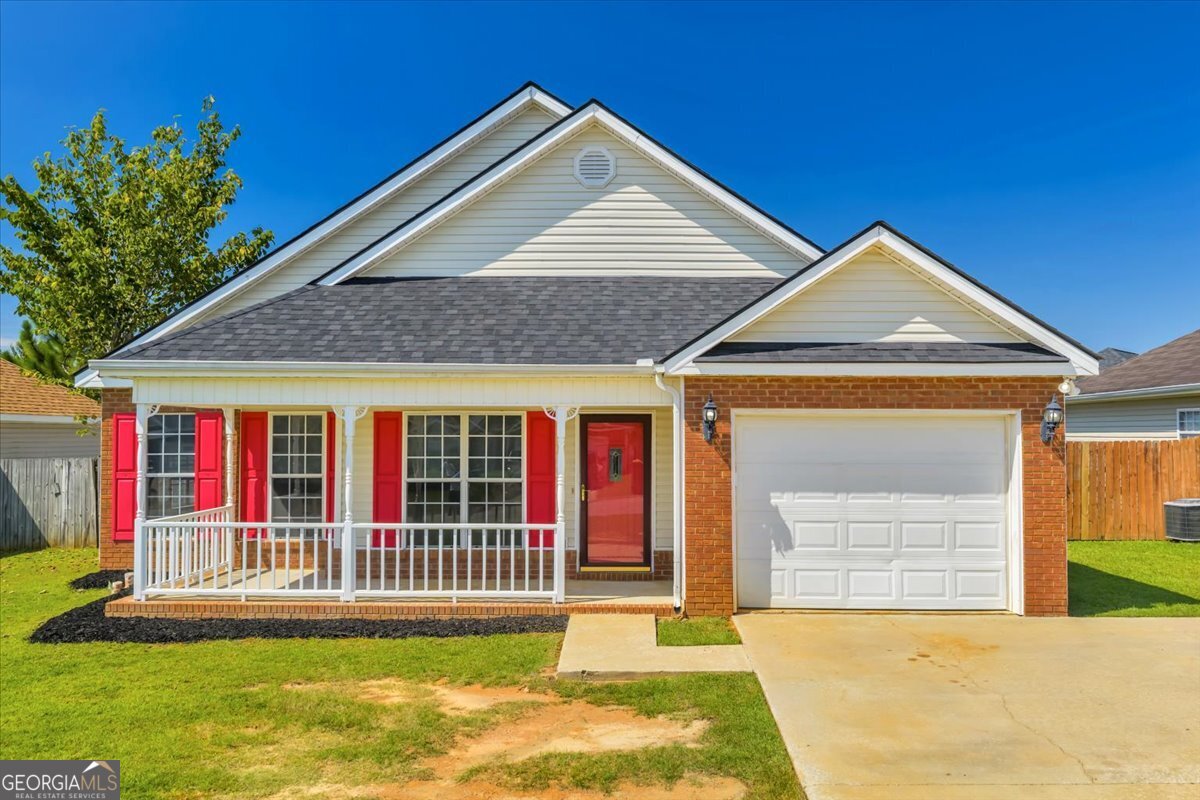 Absolutely Stunning & Move-In Ready! Can you say "Brand New Used"? A New roof (2023), New HVAC (2025) will ensure peace of mind for years to come.This beautifully maintained 3-bedroom, 2-bath home has been thoughtfully updated by the current owner with over $46,000 in improvements - meaning all the major ticket items have already been replaced. All you need to bring is your toothbrush! Step inside to find fresh paint throughout, new LVP flooring, ceiling fans updated, and a beautifully mantled fireplace as the centerpiece of the living room. A versatile 12x12 enclosed bonus room offers the perfect flex space - ideal as a second living area, office, or playroom. The kitchen shines with a new stove, dishwasher, refrigerator, and sink faucet, while both bathrooms feature new faucets and toilet seats. Outside, enjoy relaxing evenings on the wrapped front porch, and freshly painted shutters and front door. Photos have been virtually staged.