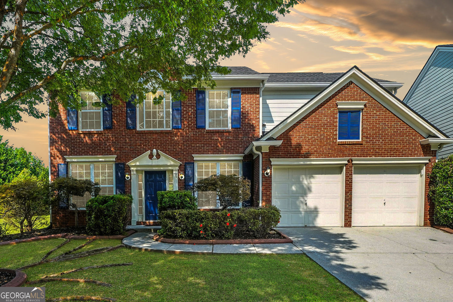 Tucked inside the amenity-rich community of The Woodlands, this well-maintained, move-in ready home sits on a quiet cul-de-sac and one of the largest lots in the neighborhood. Step through the front door into a light-filled layout with fresh paint, new flooring, and updated lighting fixtures. The formal dining room, framed with wainscoting and large windows, leads into a generous living room where a fireplace and vaulted ceilings set the tone for cozy evenings or casual gatherings. The kitchen is ready for everyday living and weekend hosting with new stainless steel appliances, a center island, and a breakfast nook overlooking the backyard. A built-in desk adds a thoughtful touch of function, whether you work from home or just need a spot to drop the mail. Upstairs, the oversized primary suite offers room to recharge, with peaceful backyard views and a private bath featuring a jetted tub, double vanity, and walk-in shower. Updated bathroom fixtures, including faucets, and towel bars, add a modern touch. Three additional bedrooms and another full bath provide flexibility for guests, hobbies, or a home office. Additional improvements include a new roof, gutters, garage door openers, exterior shutter and front door paint, and some new blinds, all adding peace of mind and fresh curb appeal. Out back, enjoy a large, private, level yard, ideal for play, pets, or future plans. Residents of The Woodlands enjoy two resort-style pools, tennis courts, a clubhouse, and miles of walking trails, all just minutes from shopping, dining, and easy access to I-575 and Highway 92. This one's truly move-in ready and waiting.