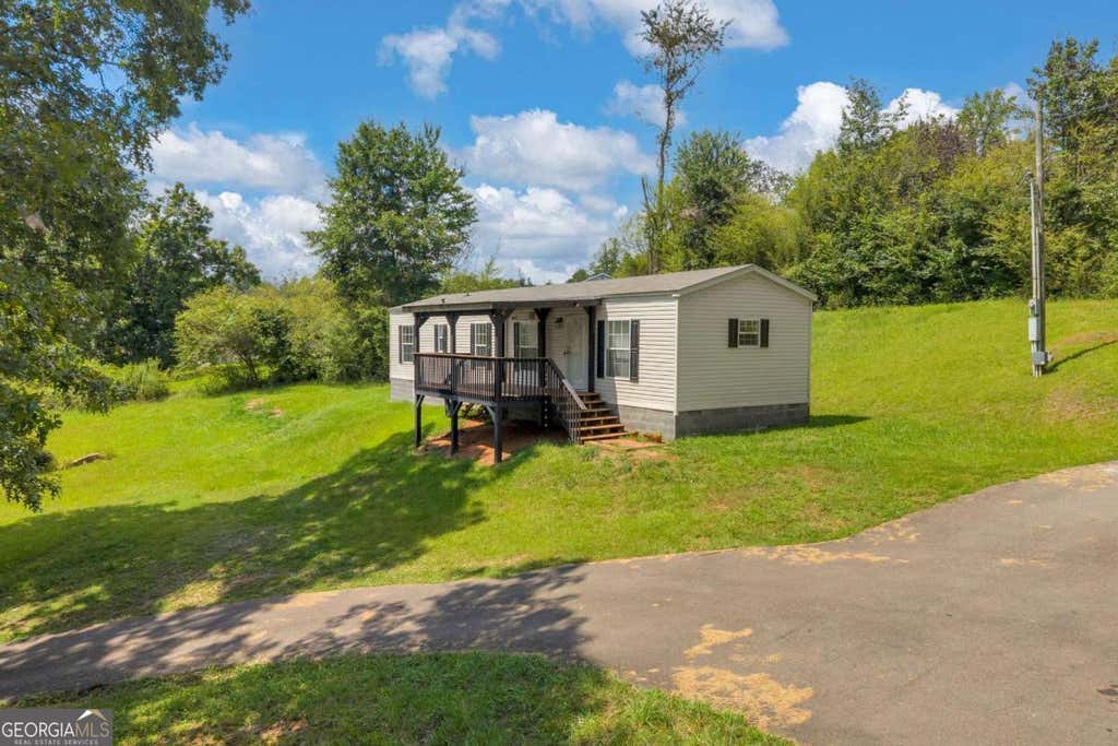 Photo of 89 Eagles Perch Road, Ball Ground, GA 30107 (MLS # 10821043)