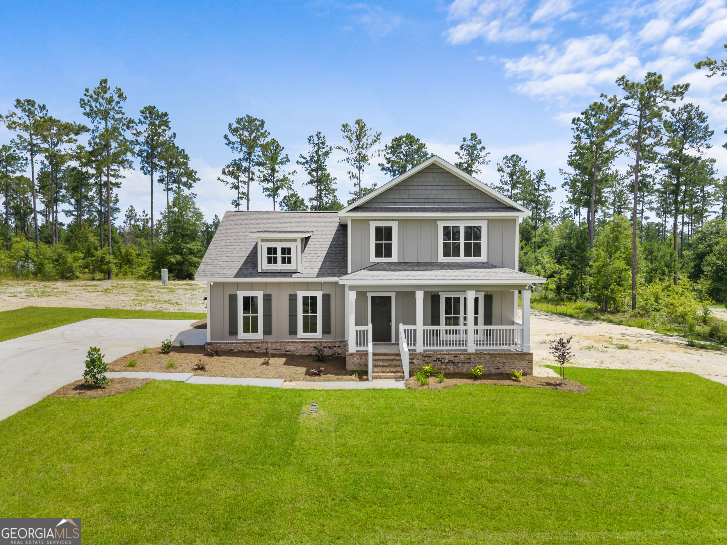 NOW OFFERING up to $20k in Builder Incentives! Check out this stunning new construction home located on the prestigious west side of Statesboro! Tucked away on 1.92 acres, this beautiful new build offers the perfect blend of southern charm architecture with a modern exterior finish and it is MOVE-IN ready! This graciously sized open floor plan measures approx. 2,150 sqft and includes custom features like stained tongue and groove ceiling in the foyer, decorative trim and designer lighting package. Durable LVP flooring throughout, custom cabinetry, quartz countertops, stainless steel appliances and sleek finishes make this home a showstopper! On the main level you will find an elegant foyer entry, conveniently located powder room and open concept living space perfect for entertainment! Just off the kitchen you'll find the primary bedroom with on-suite featuring beautiful tile flooring, dual vanities, quartz countertops, a luxurious tiled shower and a HUGE walk-in closet! Located upstairs are 2 spacious bedrooms, full bath, laundry and a large loft/flex space, perfect for kids play room or even a home office. This spectacular property offers an abundance of storage space with walk in closets throughout the home and a massive pantry in the kitchen! With too many great features to list, you have to see this one in person! Call listing agent for more info and schedule your showing today! Restrictive covenants are in place to protect property values but there are no HOA dues!!!!