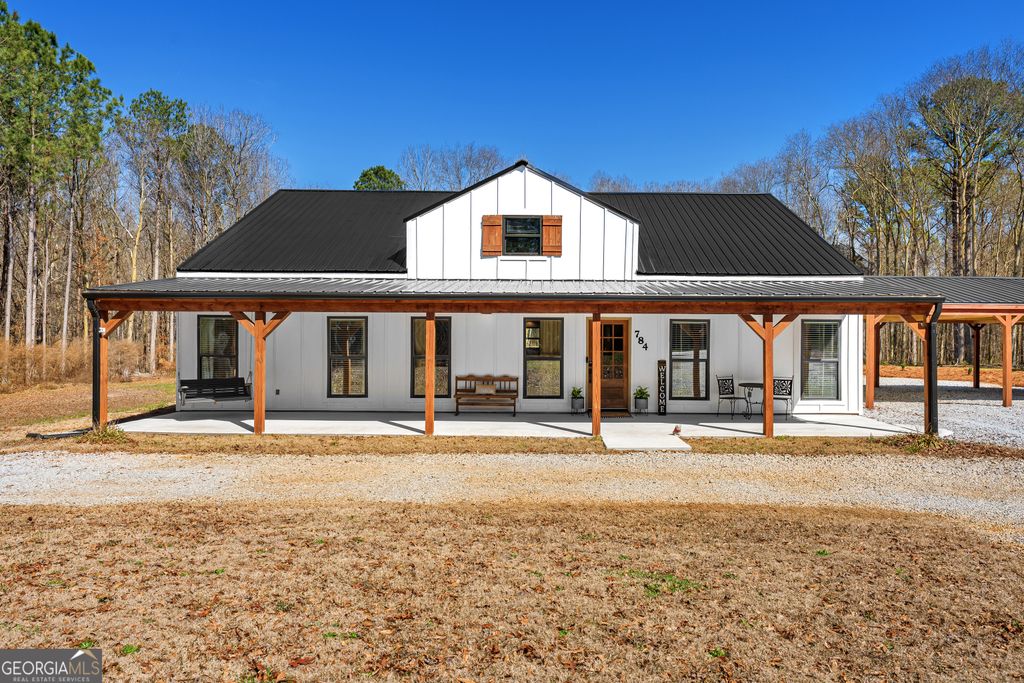 Photo of 784 Center Of The World Road, Canon, GA 30520 (MLS # 10705693)