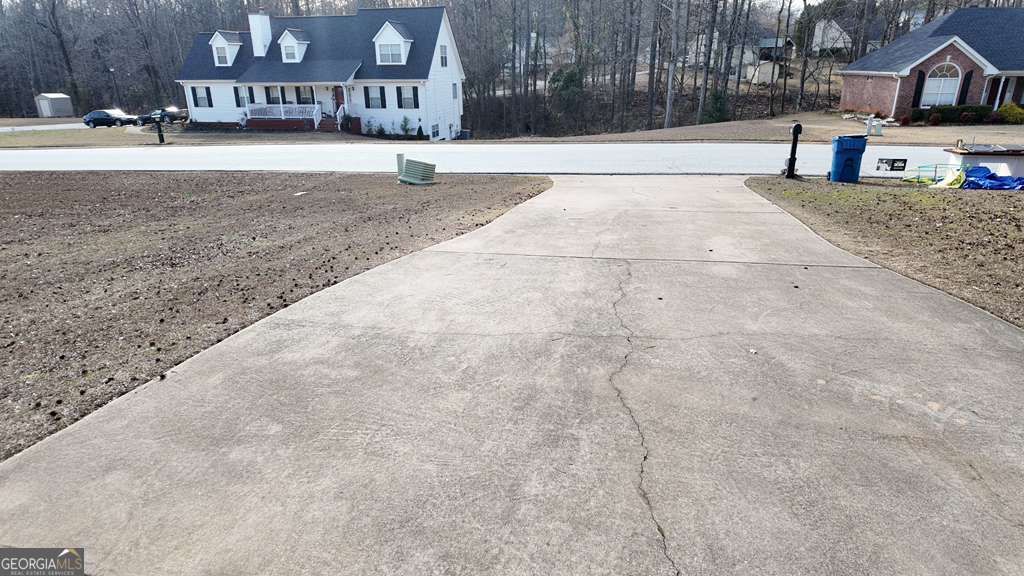 Photo of 230 Overlook Drive, Covington, GA 30016 (MLS # 10677970)