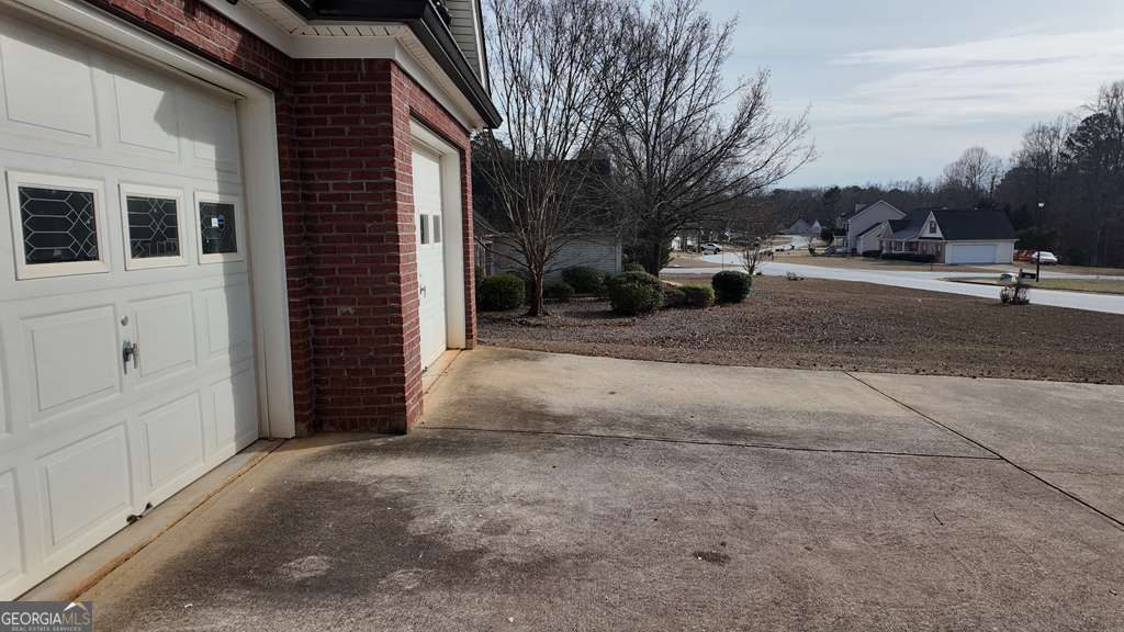 Photo of 230 Overlook Drive, Covington, GA 30016 (MLS # 10677970)