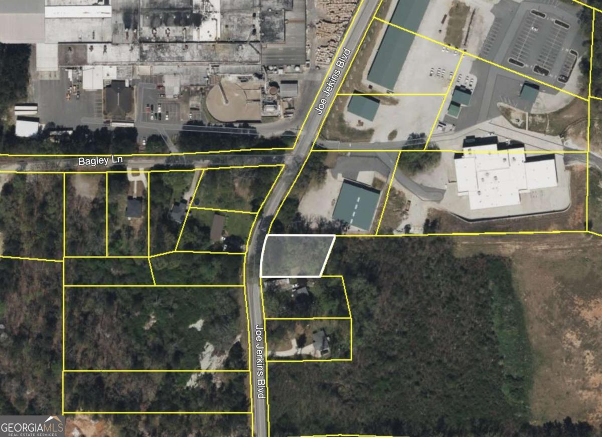 Prime opportunity to build in growing Austell! This 0.30-acre residential lot is level, wooded, and ready for your custom home or investment property. Great location near Thornton Rd, I-20, Six Flags Over Georgia, and Sweetwater Creek State Park. Minutes from shopping, dining, and schools with easy access to the East-West Connector. No HOA and utilities nearby. Bring your plans and start building. Sold as is where is.