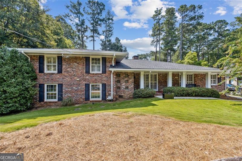 Phenomenal Home in the Heart of Oak Grove / Echo Lake! Welcome to this spacious and light-filled 5-bedroom, 3.5-bathroom with a fully finished lower level designed for both comfort and functionality. Offering a highly sought-after location and an incredible amount of living space, this home checks every box for today's lifestyle. Step inside this brick beauty to find gleaming hardwood floors that create warmth and elegance. The open and airy floor plan includes a formal dining room, inviting living room, cozy fireplace, and a large family room that's perfect for entertaining or relaxing. The finished terrace level features a private bedroom and full bath, making it ideal for a guest suite, teen retreat, or in-law accommodations. You'll also find tons of storage throughout the home-every space has been designed with practicality in mind. Enjoy a beautifully fenced backyard, perfect for pets, play, and gardening, plus a two-car garage with ample parking behind the home. Located in a walkable neighborhood near Echo Lake and zoned for the highly regarded Oak Grove Elementary, Henderson Middle, and Lakeside High School districts, this home blends community charm with convenience. From its bright interiors to its thoughtful layout and unbeatable location, this is truly a one-of-a-kind opportunity to own a home where you can sprawl, grow, and thrive.