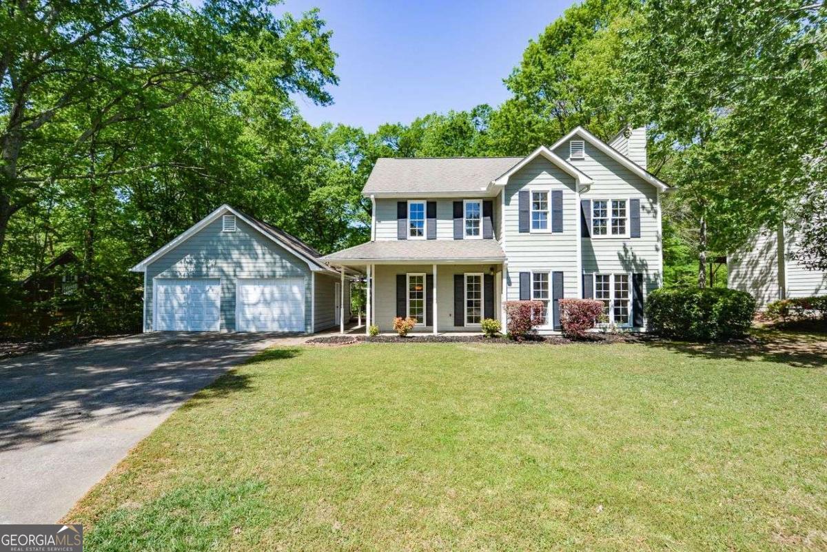 Look no further for the best valued home, located within an award winning Hillgrove high school district. This classic traditional property sits on a large flat cul-de-sac lot, located within an intimate, well established West Cobb neighborhood convenient to shops, businesses, schools and Kennesaw Mountain Park. Newly painted interior, newly enclosed sunroom, newer expanded deck overlooking a private backyard, newer hardwood floors on the main level, newer electrical auto charging station are but a few of the property improvements. The main level includes a covered front porch door entry, welcoming foyer, living room w/ fireplace, separate dining room, eat-in kitchen, food pantry, laundry, guest powder room and an inviting enclosed sunroom with access to a private backyard. Upstairs is an additional bathroom, three spacious bedrooms with closets, including the primary with ensuite bath. The property is move-in ready awaiting the perfect buyer!