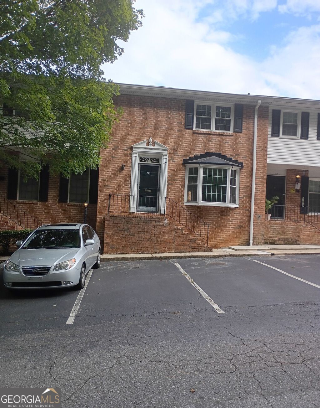 Photo of 6520 Roswell Road #48, Atlanta, GA 30328 (MLS # 10659625)