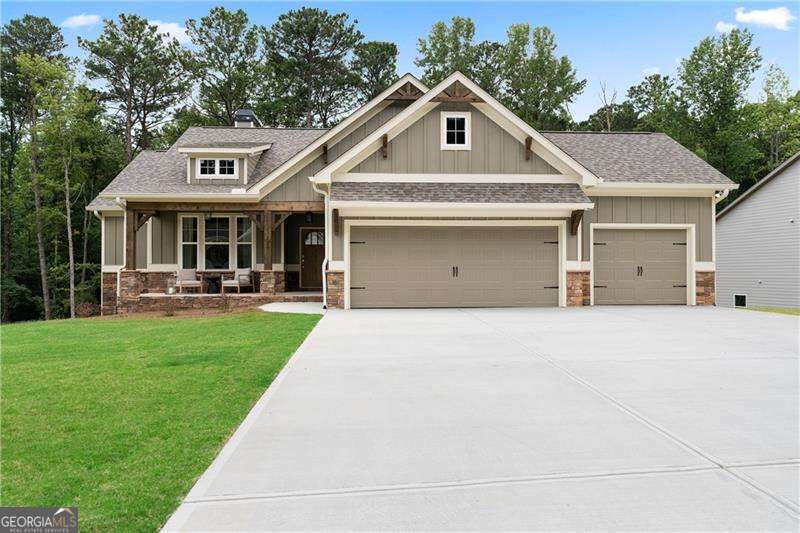 MOLVE IN READY!!! Great True Ranch Plan on Full, Unfinished Basement with with 3 Car Garage! Charming Covered Front Porch and Rear Covered Deck! 3 Bedrooms 2 Bath Open Floor Plan with Beautiful Wooded Mountain Views, Gourmet Kitchen with Granite Counters and Loads of Cabinet Space. Private Master Suite with Double Vanity, Walk In Closet and Spacious Shower.