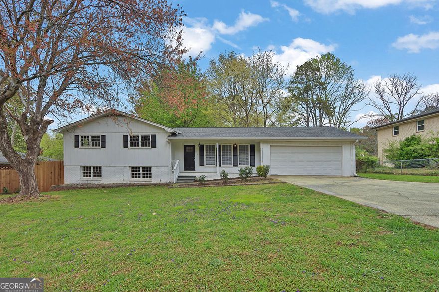 Step into this recently updated (2021) home, offering a seamless blend of modern comfort and style. With 3 bedrooms and 2 full baths on the main level, along with a fully finished lower level boasting 1 bed, 1 full bath, an office, and a bonus room, this residence provides ample space for relaxation and productivity alike. The main level features an open floor plan, where the eat-in kitchen effortlessly flows into the family room, centered around a cozy gas fireplace, creating a welcoming atmosphere for gatherings or quiet evenings. Outside, a spacious fenced yard awaits, complete with a covered patio perfect for al fresco dining or simply enjoying the outdoors. A brand-new storage shed adds convenience for all your storage needs. Ideally situated just .6 miles from the highly rated Sprayberry High School and close to shopping, parks, and an aquatic center, this home offers both comfort and convenience in a desirable location. Don't miss the chance to make this meticulously maintained home your own - schedule a showing today!