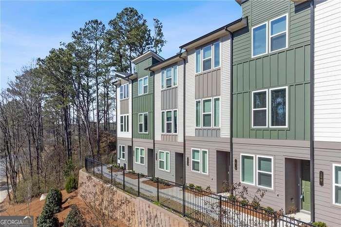 Discover the perfect blend of comfort, convenience, and sophistication in this West Elm FULLY FURNISHED dream rental located in one of West Midtown's most sought-after communities, Park Vue! Directly across from the iconic Westside Park, Atlanta's largest greenspace, this stunning 3-bedroom, 3.5-bath home offers the ideal roommate or rental-friendly layout with generous space for both privacy and entertaining. The open-concept main level features a chef's kitchen and a stylish half bath for guests, all flowing effortlessly into the dining and living areas. Step outside to a patio, perfect for al fresco dining or relaxing under the stars. Community perks include a gated entrance, pool, cabana, and a cozy gathering green with Adirondack chairs and a firepit-ideal for connecting with neighbors. Live the luxe lifestyle in one of Atlanta's trendiest neighborhoods. Don't miss this move-in-ready gem!