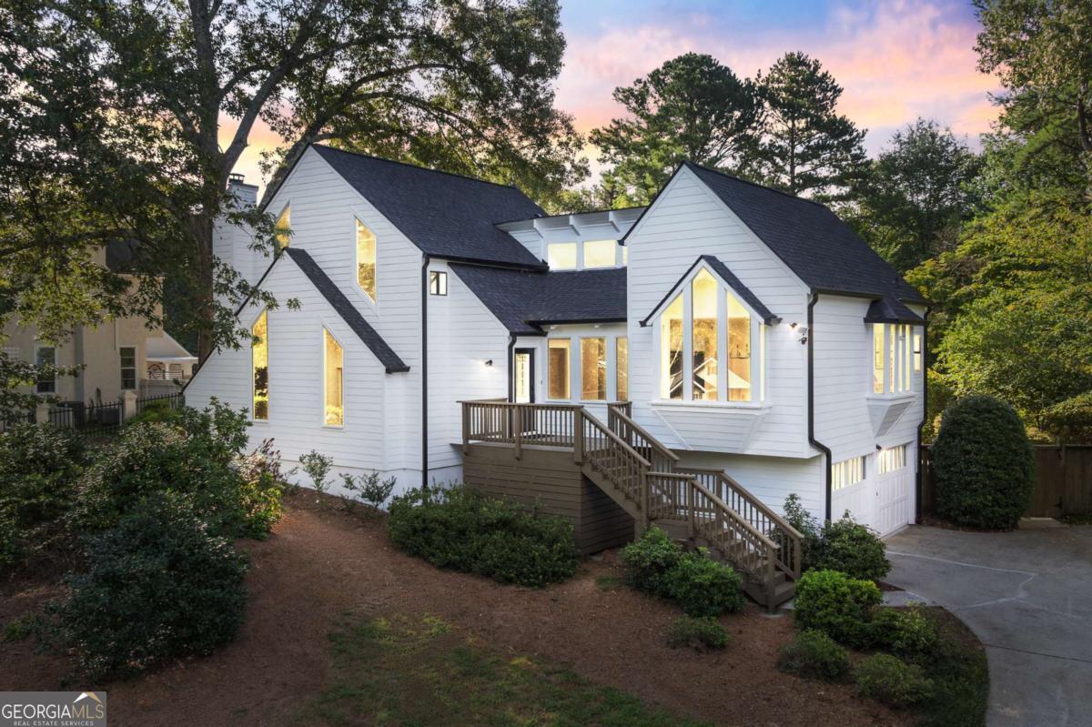Renovated in East Cobb with an In-Ground private pool! One of a few homes on the market with a private pool. This home has a new kitchen, New appliances, light fixtures, door hardware, new front deck, and much more. Enjoy the open bright space as you walk into the home with newly refinished hardwood floors, New interior paint, with views from the family rm to the new kitchen and open dining area with large windows. The private lower-level den is great for family space and or media room with a built-in Wet bar area and a gas fireplace. The master bedroom is updated with a large walk-in closet and an updated bathroom with his and her vanity. View the amazing backyard and pool from the balcony off the master bedroom with new sliding doors. Don't let the summer go by and not enjoy the pool and entertaining space. Come see this hot new listing today!