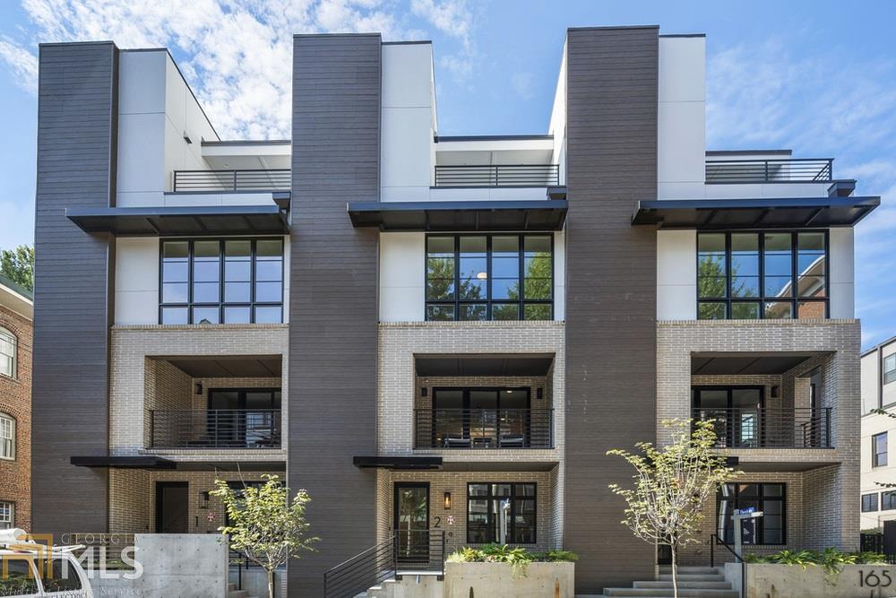 Luxury Modern Home by Epic Development less than 2 blocks off Peachtree in the Heart of Midtown. ELEVATOR included. Amazing Rooftop Terrace with covered area for shade & great city views! 3 additional furniture size terraces: off kitchen, owners suite, and living area along with a welcoming front porch; Premium interior appointments including hardwood flooring throughout, quartz countertops and Thermador appliances. Located between Juniper and Piedmont Road, steps to restaurants, nightlife, shopping, Piedmont Park. Interior photos are of home next door with similar layout. Close now.