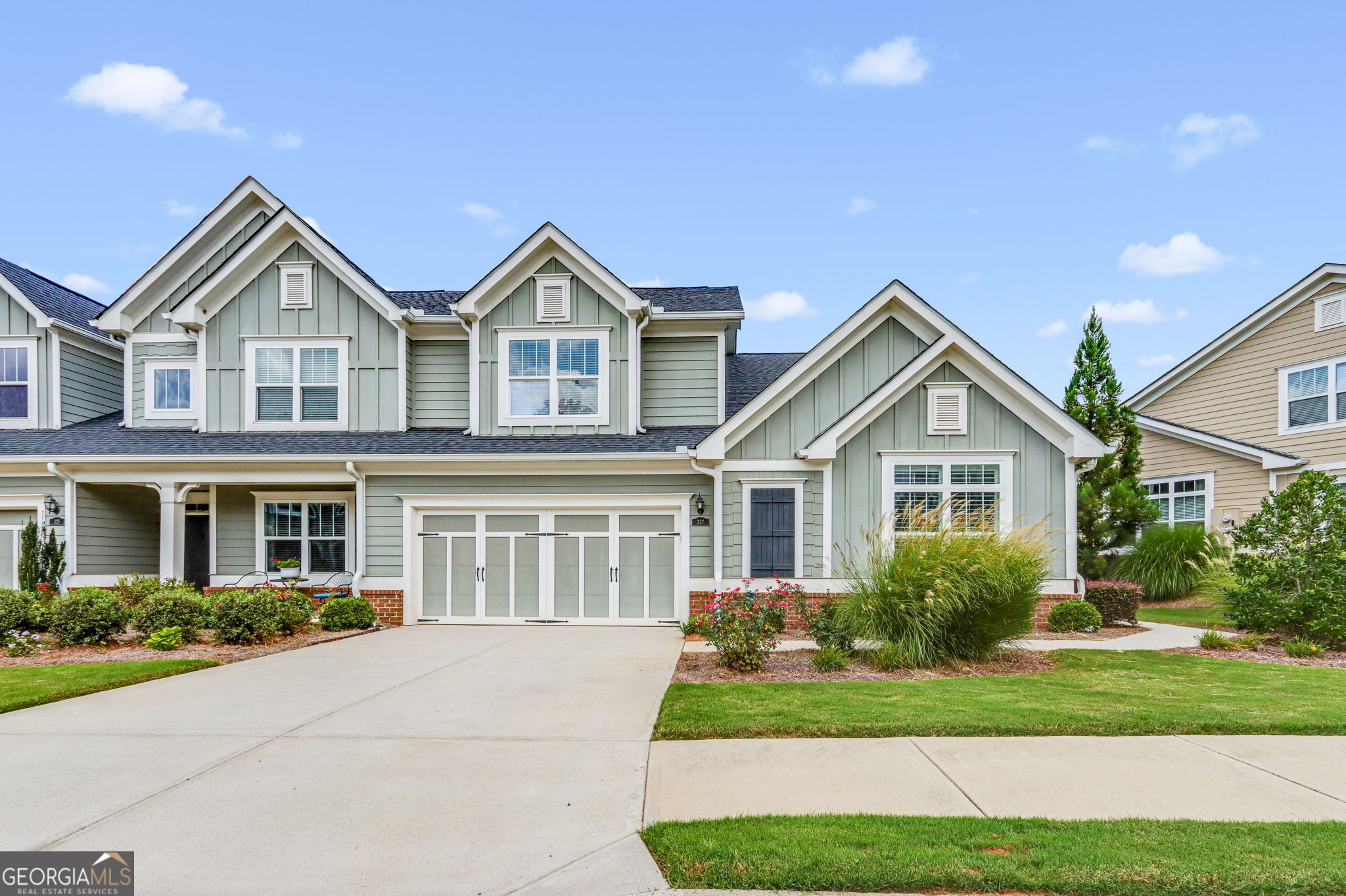 ***$10,000 Seller Incentive to use toward rate buy down or closing costs***This "right sized" ranch condo has been lovingly maintained by the original owner. Covering 2700 sq ft, offering 3 bedrooms, 3 full baths, an oversized media room and unbelievable storage, this home feels like the ideal way to transition into an easier version of homeownership. The HOA maintains the exterior of the home, lawn maintenance, landscaping and more so that you can enjoy the "lock & go" lifestyle you've dreamed of! The main floor features hardwoods throughout & stunning natural light filters through the plantation shutters. The open floor plan is ideal for hosting and the formal dining area will easily accommodate 10-12. A well equipped kitchen includes a stainless steel appliance package, ample cabinetry, and overlooks the lovely fireside great room. A generous primary bedroom on the main level features hardwood floors, a tray ceiling & plantation shutters. The en suite includes a low entry shower with built in bench as well as abundant cabinetry & walk in closet that connects to the laundry room. Also on the main level you will enjoy a guest bedroom with attached full bath and a sunroom/office that leads to the lovely screened porch. The second floor features a 22x14 media room, a 3rd large guest suite and more storage than you could imagine! Outside, the vibrant 55+ community enjoys a club house with fitness center, catering kitchen, meeting room & gathering space. The club house overlooks the community swimming pool with a deck complete with sun loungers and umbrellaed tables. Residents enjoy amazing shopping and dining at Ridgewalk, just a short 10 minute drive. *Preferred Lender is offering a $2000 buyer credit, contact John Bohannon with Edge Home Finance, 770-480-8210*