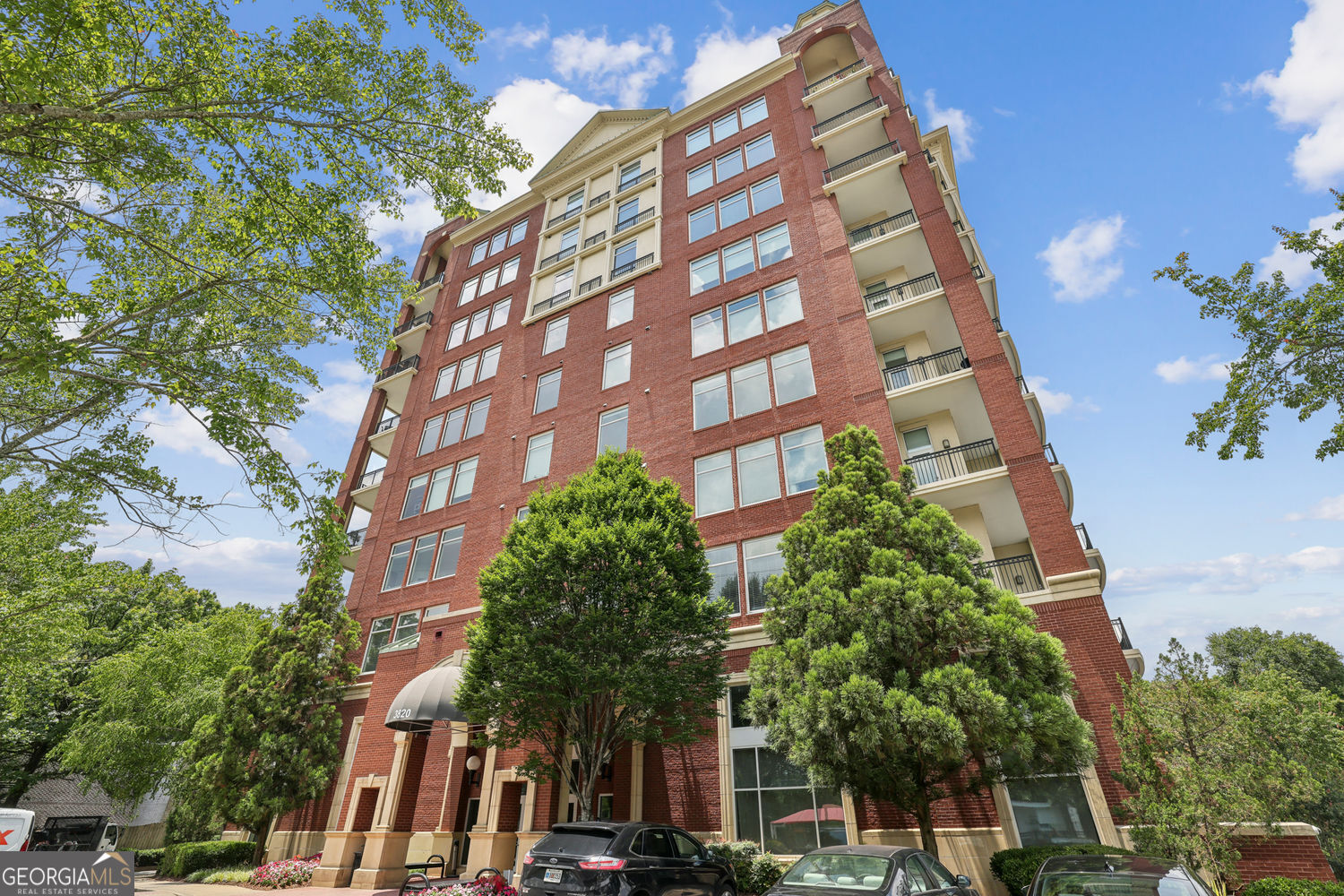 One-of-a-kind listing! Top Floor w/preferred South facing view of the city. This 1 bedroom/1 bath unit conveys with two storage units adjacent to two assigned parking spaces. A third parking space on the ground level just off the lobby also conveys. This 10th floor unit, which has never been lived in or rented, has hardwood floors, high ceilings and a large balcony with skyline views of Buckhead and the city. In this floor plan, the kitchen with a brand new Bosch dishwasher and separate large pantry, opens to the living and dining areas. All appliances including refrigerator, oven, cooktop vent hood and washer and dryer remain. The bedroom has new carpet and bathroom has double vanities, garden soaking tub and separate shower. The guest powder room can be closed off from the primary bath. The View at Chastain has amenities including: 24-hour concierge and gated parking garage for safely, grand lobby and community room with media and catering area, fully equipped fitness center, sauna, pool and grilling area. Guest parking is located along the north side of the building. This building is FHA approved and investors are welcomed. The View at Chastain is just steps away from restaurants, bars and shops and has Chastain Park just around the corner. See this stunning unit today!