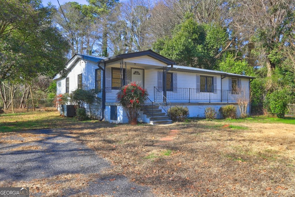 Photo of 7779 Adamson Road, Jonesboro, GA 30236 (MLS # 10668530)
