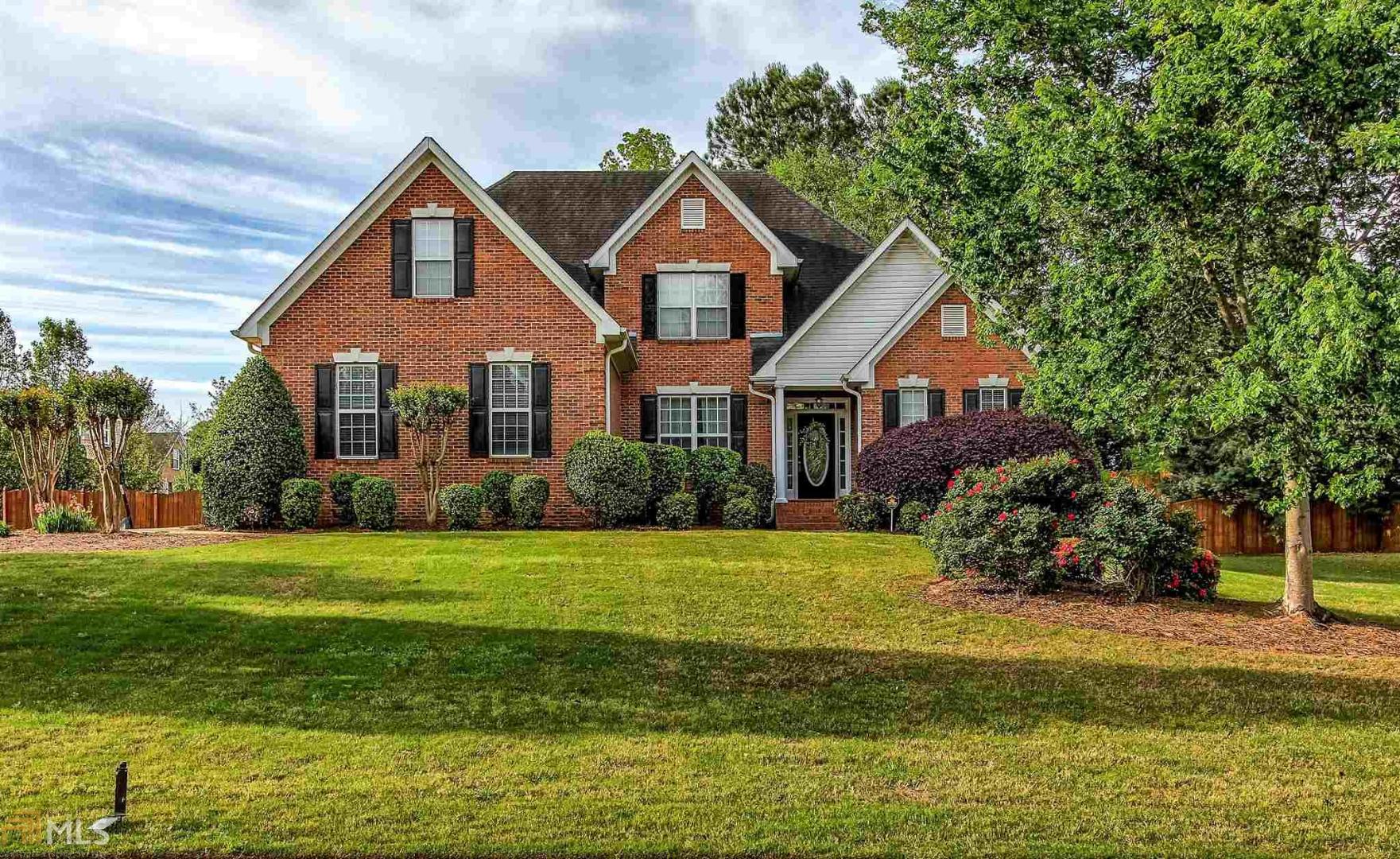 BRAND NEW ROOF! Absolutely stunning home in OLA SCHOOL DISTRICT! Four sided brick with professional landscaping. 4/2.5 baths with large master on the main level. Master suite includes trey ceiling, sitting area, large walk in closet and master bath has a HUGE two person jetted tub. Gorgeous living room with high ceilings for great natural light, and fireplace. Oversized kitchen with island/bar seating, breakfast nook and office space. Secondary bedrooms are a generous size and so is the full bath upstairs. The back porch is an entertainers dream, covered back porch with ceiling fans, and a bbq area. Large fully fenced in backyard is perfect for pets to play!