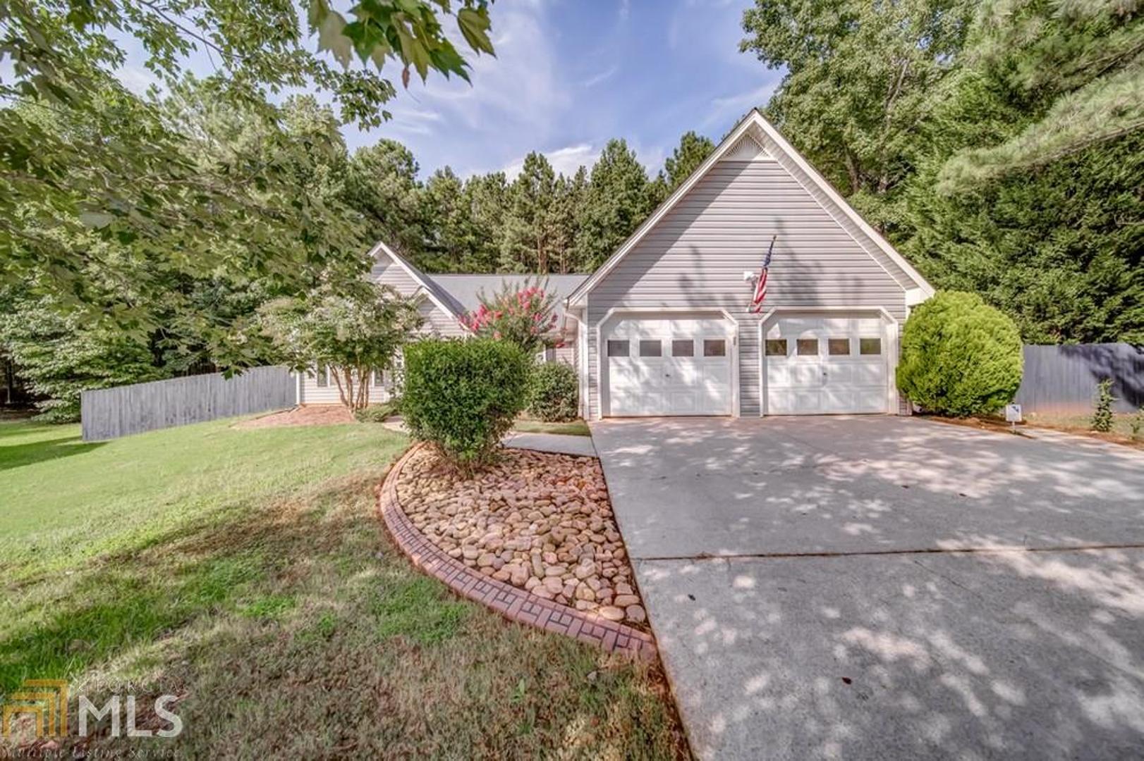 Adorable open concept ranch home with a very private level back yard perfect for entertaining or relaxing. You will love the look and feel of the wood grain ceramic tile throughout the entire house. Kitchen has all ss appliances and offers plenty of counter space and an eat in area overlooking the large family room with vaulted ceilings and fireplace. This home is 100% move in ready, do not miss out!