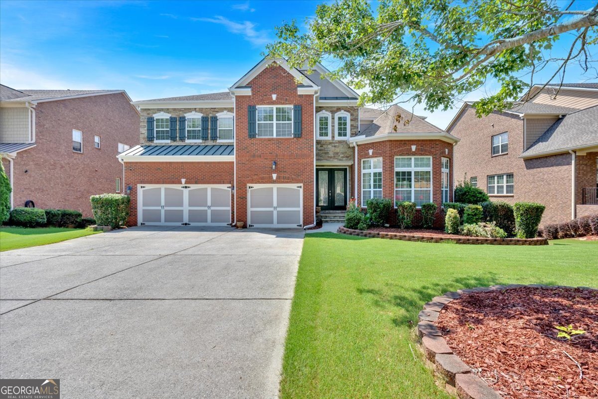 Welcome to 3819 Courson St in sought-after Marietta, GA-an exceptional all-brick home offering the perfect blend of luxury, functionality, and space. This stunning residence features 5 spacious bedrooms and 4.5 beautifully appointed bathrooms, ideal for both everyday living and entertaining.Step inside to be greeted by a soaring cathedral ceiling in the living room, anchored by a cozy fireplace that creates a warm and inviting ambiance. The chef's kitchen is a showstopper, complete with a large center island, granite countertops, and top-tier finishes-ready for gourmet meals and gatherings alike.Downstairs, the finished basement is a true entertainer's dream. Enjoy movie nights in your very own private theater, or host with ease thanks to the wet bar and kitchenette-perfect for guests or multi-generational living.Additional highlights include a three-car garage, generous living space throughout, and premium details that set this home apart. Conveniently located near top-rated schools, parks, and local amenities-this home is a rare gem in Marietta!