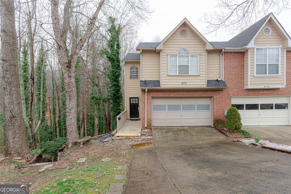 Lake Views for a Steal! Come See this End-Unit Townhouse Today! You'll Love the Peaceful Neighborhood, Especially in this Cul de Sac Location comes with a 3 Levels space! Plenty of Room for All Your Needs. Gorgeous Granite and Trendy Paint Colors. Enjoy Cooking Out on the Back Deck Overlooking the Community Lake. Use the Basement for as an Extra Suite for Guests, In-Laws or Teens. There is a backyard with a rear porch and a 2 car garage