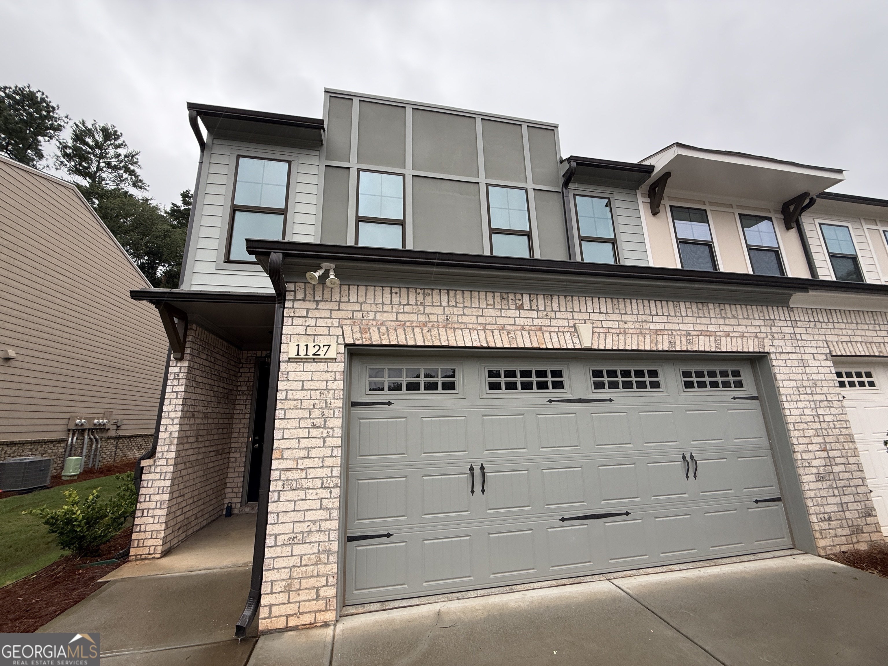Rare & Fabulous Four Bedroom w/ Three & 1/2 Bath in a Newer Gated Townhome Community in an Awesome Duluth location & Peachtree Ridge HS District. This is also an END UNIT w/ has a Private Backyard & Two Car Attached Garage! The Open Floor Plan features natural sunlit, quality laminate flooring on the main level & boasts a fireplace in the great room. And the Chef's Kitchen has beautiful, light quartz counters, stainless appliances & stained cabinets! The second level features the same hall flooring as below & a bonus open landing / flex area. The spacious primary suite is located at the rear for more privacy & features a fabulous primary bath & TWO Walk-In Closets! Two more generous bedrooms & a full bath complete the 2nd level while the 3RD Level boasts another Bedroom / Media / Flex Room / Office complete with a Full Bath & Closet! You will not be lacking for space in this property or quality. Price below the current new construction & Larger - Quick Closing is available. No Need to wait - as this is 'Move-In' Ready!!!
