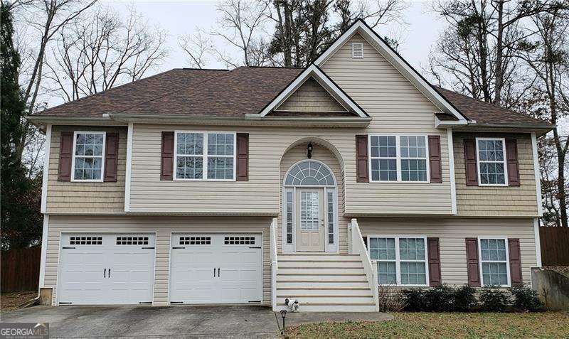 An enjoyable+lovely home in a quiet neighborhood just minutes to I75 and the outlet mall+all its nearby amenities*Just finished a large 4th bedroom/bonus room (14x19ft ) on the terrace level*This will make this a 4 bedroom-2bath home*The private fenced back yard backs up to a 10 acre estate*in the back is an outbuilding for your outdoor tools etc*the private deck is perfect for entertaining*The kitchen has plenty of like-new cabinets+stainless steel appliances plus a comfortable breakfast area with a view*The large open family room+extra dining area has hardwood laminate flooring*The oversized master suite features a trey ceiling +windows overlooking the private back yard*The master bath has a garden tub and separate shower, private toilet area(room)+a walk in daylight master closet*There is plenty of room in this home to stretch out and relax*plus you have an extra room on the lower level for a workshop or extra storage*call today to see it*