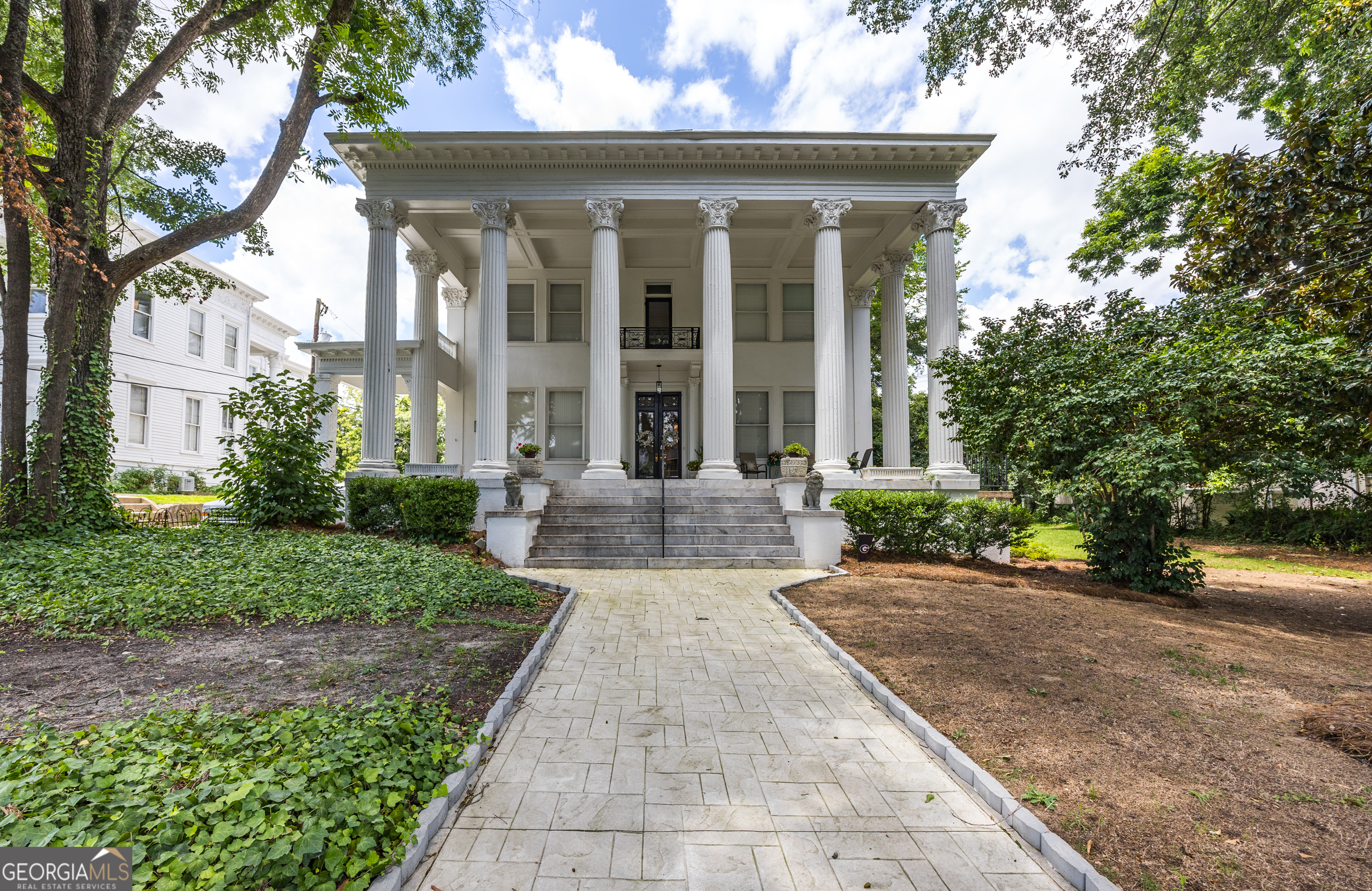 Welcome to Voland Manor! A Historic Gem in the Heart of Macon. Nestled on Prestigious College Street in the Middle of Downtown Macon, Voland Manor is Magnificent, Fully renovated Estate that seamlessly blends timeless grandeur with modern Luxury. This Iconic Residence offers an exceptional opportunity for investors and discerning buyers alike. The Main home features soaring ceilings, original hardwood floors, designer kitchen, and beautifully appointed bathrooms. Three full baths , and two half baths, the layout is perfectly positioned for Mercer University's medical and law students. Rental details available upon Request. This historic Showpiece is more than a home. It's a Statement. Voland Manor awaits a sophisticated buyer who appreciates architectural distinction and Investment potential. See Private Remarks for Rental Income information. 5 rental units included in the square footage.