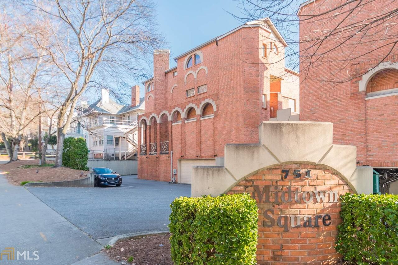 AWESOME 4-level Townhouse! Tons of Upgrades with 2 car garage in HEART OF MIDTOWN with No Rental Restrictions LOW HOA FEES! Gated Courtyard! Updated Kitchen with S/S Appliances , Breakfast bar overlooking Great Room with Fireplace and Beautiful Hardwood Floors 3 levels ! New Carpet and Paint throughout , New Zoned Heat and Air * Newer hot water heater * Spacious Master Bedroom has Large walk in closet and a walk out Balcony* Top level has separate office, * Spacious 2nd bedroom with bath , mins to Piedmont Park, Restaurants,, FOX Theater! GREAT LOCATION !!!!!!