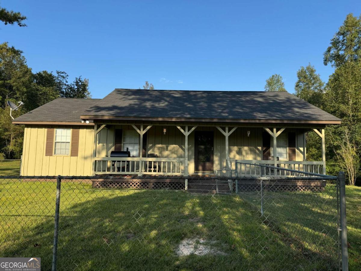 Cutest Bungalow home on 3 Acres!! This is the cutest home and ready for its new owners. Enjoy the evening view on the private front porch or the gorgeous view of your own land from the extra large back deck. This home has so much charm and features a large laundry room, updated kitchen, hardwood floors, fenced front yard, and a 2 car attached garage. New paint and a new roof in 2023, so this home is ready!