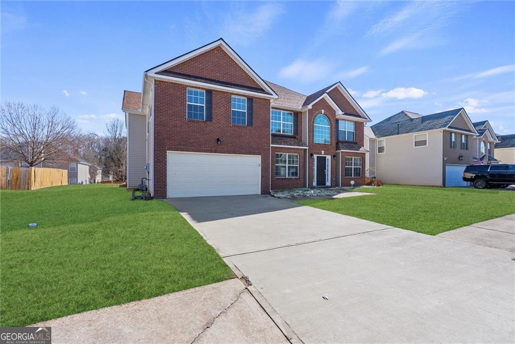 Photo of 541 Hamlet Drive, Hampton, GA 30228 (MLS # 10836870)