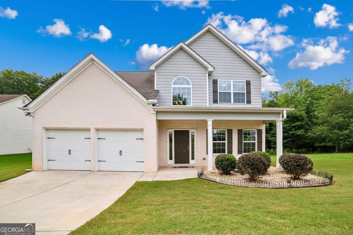 Located in the sought-after community of The Glen at Eagles Landing, this well-appointed 4-bedroom, 2.5-bath residence offers a spacious and functional layout ideal for a variety of lifestyles. Step into a welcoming foyer that opens to a formal dining room and a generous great room, perfect for everyday living and entertaining. The kitchen features granite countertops and ample cabinet space, offering both style and utility. Upstairs, the oversized primary suite includes a private ensuite bathroom and a walk-in closet, providing a comfortable retreat. Additional bedrooms are well-sized, offering flexibility for guest rooms, office space, or hobbies. Situated in a well-maintained subdivision with convenient access to shopping, dining, and major highways, this home combines comfort, location, and value.