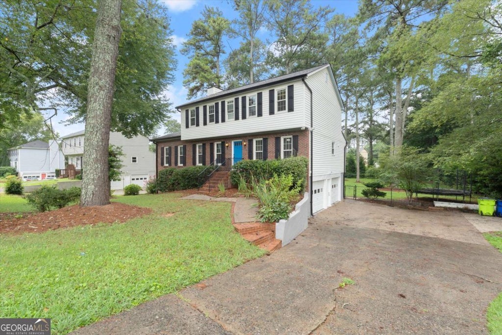 Photo of 3220 Casteel Road NE, Marietta, GA 30062 (MLS # 10813773)