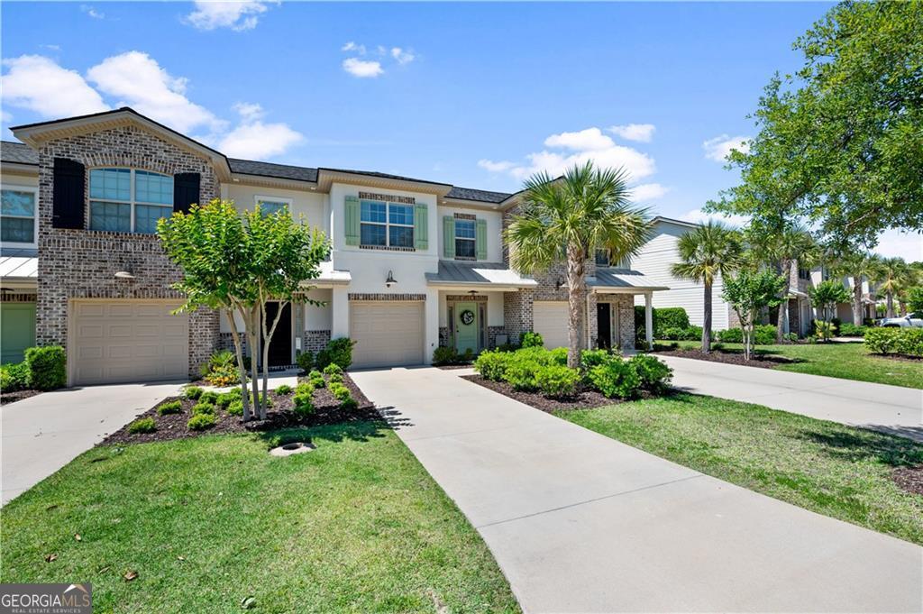 Welcome to this exquisite townhome, a perfect blend of luxury, comfort, and convenience, fully furnished townhome in the heart of St. Simons Island! This 3-bedroom, 2.5-bath residence offers the perfect combination of comfort, convenience, and coastal charm. With an inviting open floor plan, tasteful furnishings and modern finishes. The spacious kitchen features stainless steel appliances, ample cabinetry, and a breakfast bar, perfect for entertaining or casual dining. The living and dining areas flow seamlessly, leading to a serene screened-in back porch where you can enjoy tranquil views of the lagoon. Upstairs, the primary suite offers a private retreat with a large walk-in closet and en-suite bath, while two additional bedrooms share a full bath, ideal for guests. Additional highlights include a one-car garage with plenty of storage throughout. Mariners Landing is a quiet community in a prime location with easy on-off island access and is near the beach, shopping, restaurants and the Village. It's within walking distance to St. Simons Marina where you can put your boat in the water, enjoy a walk through Gascoigne Park or play a round of disc golf. Relax at the community's pool, only steps from your front door Whether you're looking for a primary residence, vacation home, or investment property.