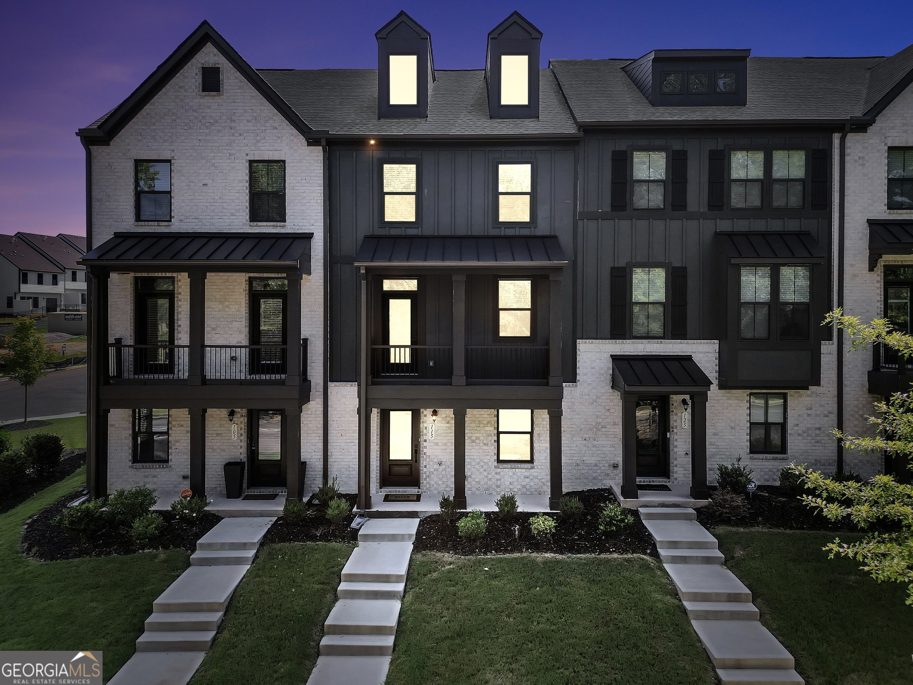 Welcome to the largest and most sought-after floorplan in this exclusive community with over 2,000 square feet of stylish, functional living space and the last opportunity to own a 3-story townhome, as no more are being built! This stunning and modern townhouse boasts 3 spacious levels of thoughtfully designed living space, featuring custom upgraded lighting throughout and luxury fireplaces in both the living room and oversized owner's suite. The main floor offers an open-concept layout that's perfect for entertaining, highlighted by a completely updated kitchen with new granite countertops, a large island, and seamless flow into the living and dining areas. Step right out to your private front balcony-ideal for morning coffee or evening relaxation. Upstairs, you'll find a truly oversized owner's suite complete with high ceilings, ample closet space, and a cozy fireplace. The spa-like bathroom features a double vanity, large walk-in shower, and a soaking tub for the ultimate in comfort and relaxation. The ground floor includes a versatile bonus room, and the seller is willing to convert this space into a full bathroom, offering even more flexibility for guests. Enjoy a 2-car garage, and an unbeatable location just minutes from the City of Fayetteville, Fayette County High School, and Piedmont Fayette Hospital. This home combines sleek, contemporary design with unmatched functionality and location.
