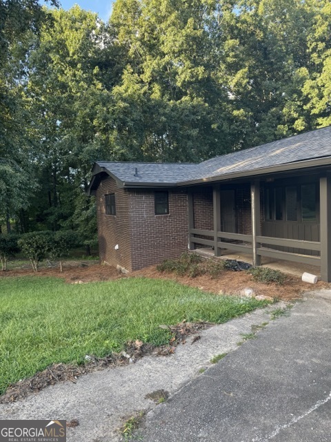 Welcome to this stunning, newly renovated brick home nestled on a spacious 1/2 acre lot in the highly sought-after Bremen City School District. Boasting 5 bedrooms and 3 full bathrooms, this home offers the perfect blend of modern updates and classic charm. Upstairs, you'll find three spacious bedrooms, including a versatile flex space perfect for a home office, playroom, or guest room. The heart of the home opens up to an inviting living area and a beautifully updated kitchen ready for entertaining. Downstairs features a fully finished basement with two additional bedrooms, sleek finished concrete floors, and ample room for guests, in-laws, or a private retreat. Enjoy summer evenings on your brand-new deck, overlooking the peaceful backyard-ideal for relaxing or entertaining. With no HOA, you'll have the freedom to make this home truly yours. Located just minutes from downtown Bremen and I-20, this home combines comfort, convenience, and top-rated schools in one incredible package. Don't miss your chance to own this move-in-ready gem!