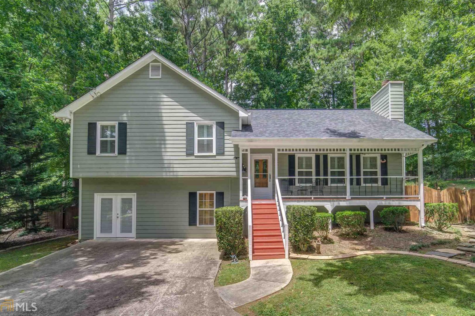Meticulously maintained home with deep driveway for privacy and parking an RV or a boat. New arch. roof, new dbl pane windows, newer HVAC, newer appliances, Castleberry Plantation Shutters, hdwds in foyer, D/R, stairs & hallway. Swanstone counter in kitchen, baths & shower. Bevel leaded insulated steel frt dr w/storm door, rocking chair front porch. Priv bkyd w/lrg deck, pergola and an above ground pool & stone patio. Fin bsmt. Sought after school district close to everything. Lake Allatoona mins away!