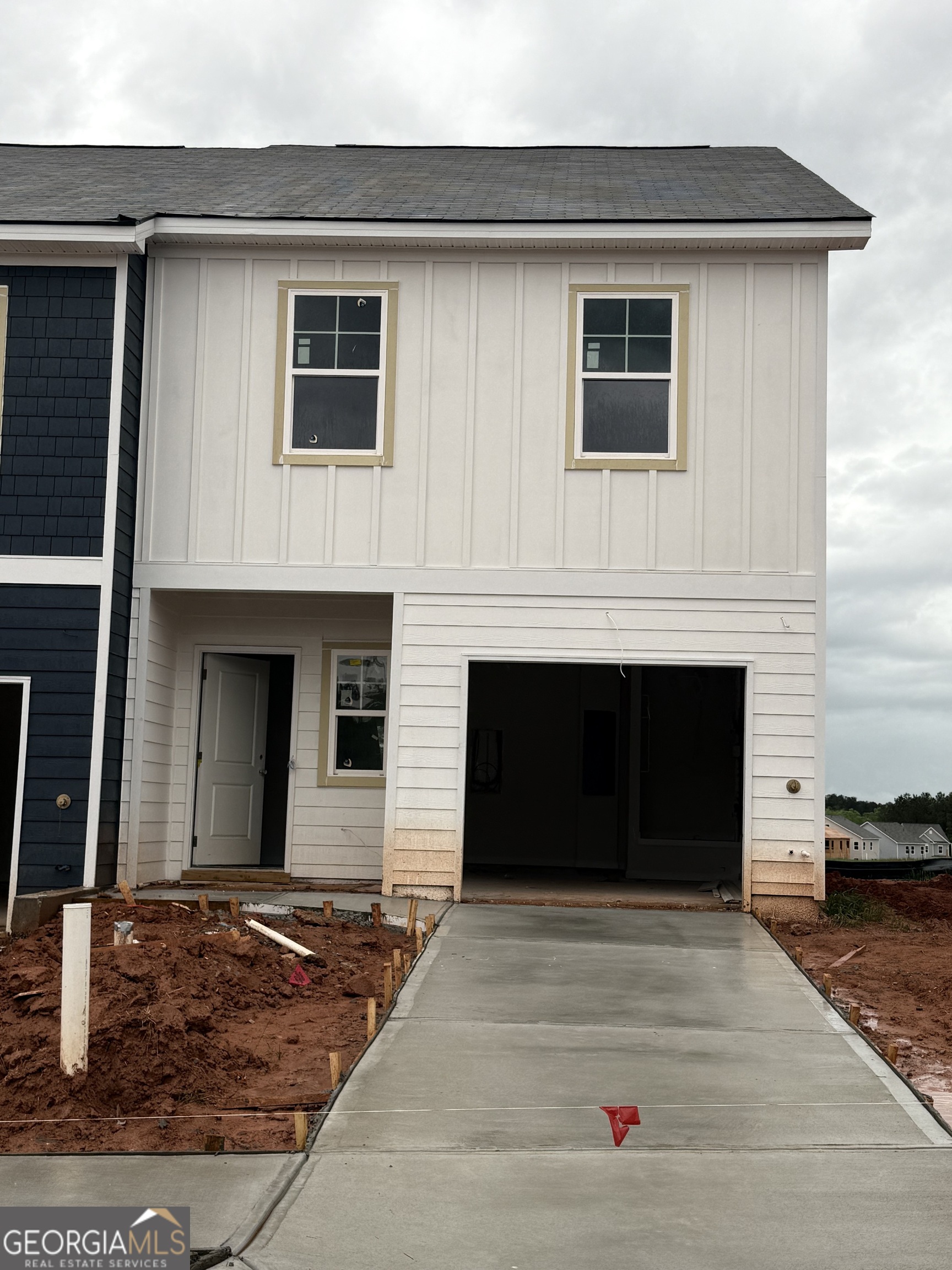 Welcome to The Collection at Walden Park - One of Rockhaven Homes Newest Townhome Communities! Experience the perfect blend of affordable luxury in this beautifully designed neighborhood. Introducing the 'Astin A' floorplan, offering a thoughtfully designed living space. This stunning townhome features modern upgrades and a contemporary open-concept layout. The gourmet kitchen boasts granite countertops, stainless steel appliances, and elegant 42-inch gray cabinets with crown molding. Enjoy the convenience of keyless entry, 2" wood-faux blinds throughout, and the latest in smart home technology. Upstairs, the luxurious owner's suite offers tray ceilings, a spa-like bath with an oversized shower, a separate water closet with a window, and a huge walk-in closet. Two additional generously sized bedrooms feature vaulted ceilings, ample natural light, and spacious closets. A one-car garage with automatic door openers adds extra convenience. Located in The Retreat at Walden Park, residents enjoy resort-style amenities, including a swimming pool, cabana, playground, dog park, and scenic walking trails. Plus, with easy access to shopping, dining, and major highways (I-75 & I-285), commuting is a breeze. Don't miss your chance to be one of the first to call Walden Park home! Schedule your tour today before it's too late!