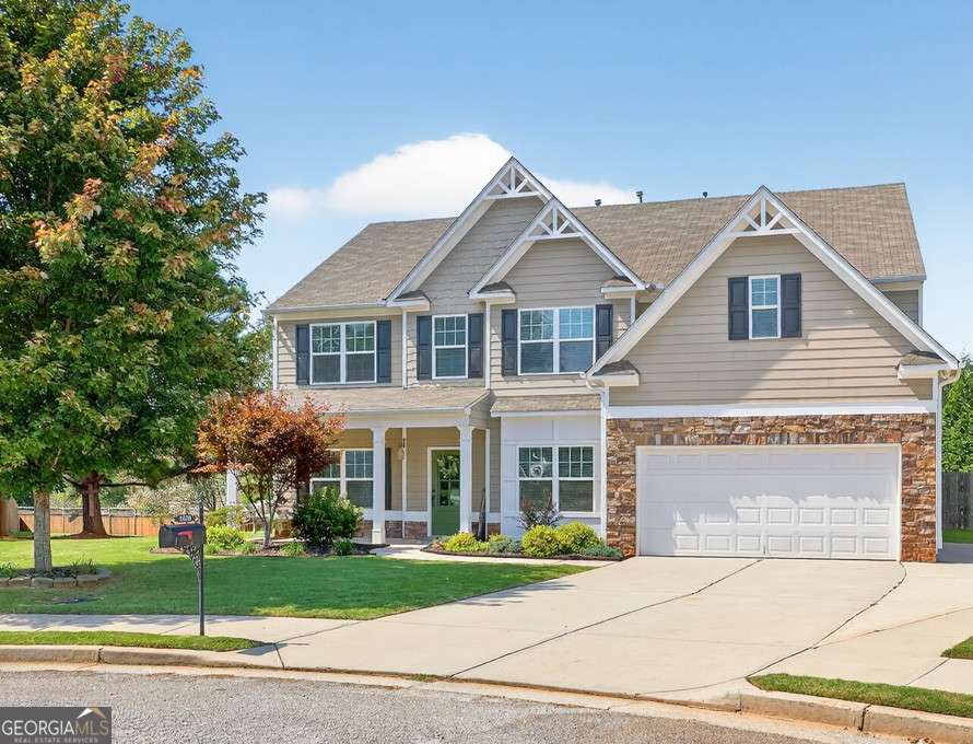 Welcome to this stunning 5 bedroom, 2.5 bath home offering an ideal blend of elegance and functionality. Step inside to find a spacious office, formal dining room, and an open-concept layout designed for both everyday living and entertaining. A bedroom on the main level provides flexibility for guests or multigenerational living. The gourmet kitchen is the heart of the home, featuring white cabinetry, granite countertops, stainless steel appliances, a large island, and an oversized walk-in pantry. Flowing seamlessly from the kitchen is the grand 2-story living room, filled with natural light and open, airy spaces perfect for gatherings. Upstairs, retreat to the grand primary suite with tray ceilings, a cozy sitting room, and abundant natural light. The luxury primary bathroom boasts dual vanities, a soaking tub, a separate glass shower, and a huge walk-in closet. Spacious secondary bedrooms offer their own walk-in closets and great natural light, with a full bath conveniently located nearby. Enjoy game days and outdoor living on the covered back porch, perfect for Saturday football and year-round entertaining. Situated on a quiet cul-de-sac lot with partial fencing and a spacious shed, this home checks every box!