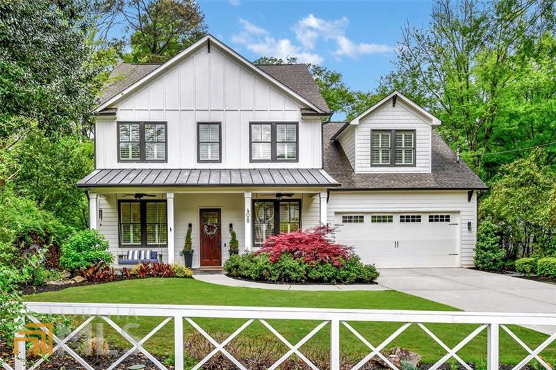 Looking for a better-than-new-construction heart throb in a great Decatur location? Look no further! This home is a T-E-N, and offers some of the best living in Decatur. The moment you pull up you'll see this farmhouse chic newer build has been tricked out, beginning with the white picket fence and continuing throughout to the backyard outdoor oasis. A wide welcoming slate front porch overlooks the perfectly manicured lawn that features stunning landscaping thoughtfully curated for all the seasons. Open the craftsman front door into the wide shiplap foyer, graced by stunning oak site-finished hardwood floors. Custom barn sliding doors open into the main level light-filled guest suite with a private bathroom. Don't need a bedroom suite on the main level? This room also doubles as a home office, playroom or flex space. Walk across the hall to the stunning dining room, featuring coffered ceilings, plantation blinds, and judges paneling; this is the perfect room for entertaining and flows to the kitchen by a well-stocked Butler's Pantry and a separate walk-in pantry. The stylish kitchen also boasts a microwave drawer, wine cooler, and stunning herringbone backsplash.  The open-plan chef's kitchen is accented by the quartz island with integrated storage and sleek stainless steel appliances. The kitchen upgrades include a continuation of the herringbone backsplash, six burner gas range, custom range hood cover, fresnel glass pendant lighting, and stunning quartz. The shiplap continues on the feature fireplace, graced by built-in bookcases which opens onto the backyard oasis- more on that later. Completing the main level is a powder room and a mudroom connecting the attached two-car garage to the kitchen and main level space.  On the second level, the oversized private primary bedroom suite boasts hardwood floors, a walk-in closet with built-in shelves and a luxurious bathroom with a frameless oversized shower with floor-to-ceiling tile. Soak your cares away in the deep tub with shower attachment. This upper level features three additional bedrooms, one of which is oversized, offering ample spaces for sleep, play, media room, and office- the possibilities are endless. Don't forget to check out the oversized laundry room with a utility sink and extra storage before you head outside. Step outside from the living room to the backyard oasis. The covered porch is graced by a slate stone patio and opens to your outdoor fireplace resplendent in wild roses and clever built in firewood storage. Imagine enjoying your coffee, cocktails, and cuisine right outside. There's more. Check out the outdoor kitchen perfect for all your BBQ and cookout needs. Whether retreating or entertaining, in this outdoor space you'll forget you are just minutes from everything in Decatur. Easy access to Downtown Decatur, Emory, the CDC, VA, Decatur Square, Toco Hills, shopping, restaurants, and more with unincorporated Dekalb taxes.