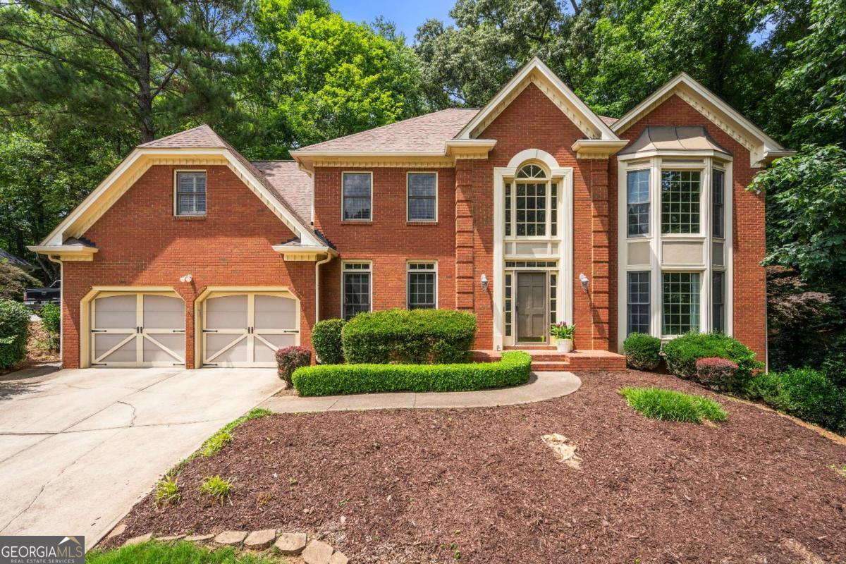 Spacious 4BR/3.5BA home with fresh paint and new carpet throughout. Features include a bright two-story foyer, formal living and dining rooms, and a large kitchen that flows into the family room. Upstairs, the primary suite offers a bay window, soaking tub, separate shower, and walk-in closet. A private guest/teen suite with full bath adds flexibility. Enjoy a screened porch, open deck, and private backyard-perfect for relaxing or entertaining. Basement provides plenty of storage. Move-in ready and located in a top-rated Pope High School district! Credit check and background check are mandatory and outsourced to a third party. Tenant(s) combined income must be 2 times monthly rent. All tenants 18+ must fill out application. Application fees are non-refundable: $55.00 for an individual & $65.00 for a married couple. Tenants are responsible for all utilities and HOA fees.