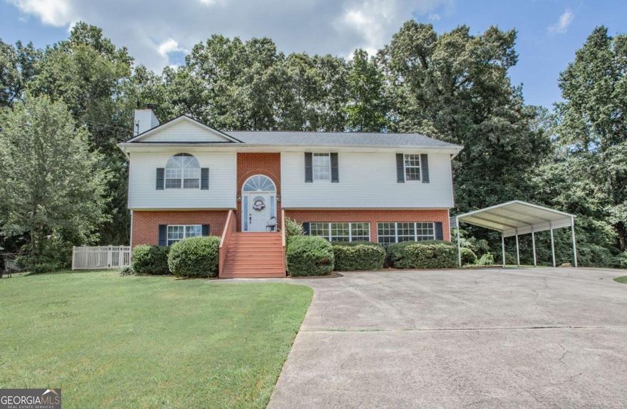 There's so much space packed into this mostly remodeled Carrollton City home with a view of Lake Carroll! This gem has so much room to grow with 3 bedrooms, 2 baths on the main level a finished lower level with an additional bath, and two huge rooms to easily have Flex space and additional bedrooms with minimal effort. It has a 50-year shingle roof that's 2 years old, new A/C, flooring, cabinets and vanities, appliances, porch, and deck and carport. Conveniently located to downtown Square, Lake Carroll, and the Greenbelt! Schedule your appointment today.