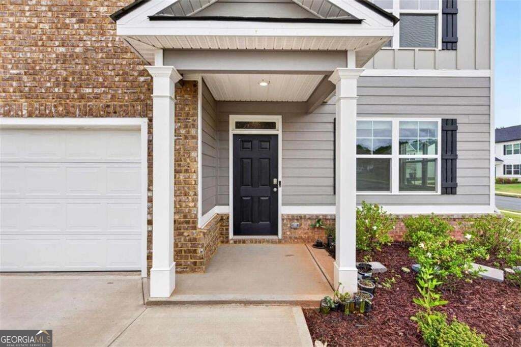 Photo of 155 Amberjack Trail, Covington, GA 30016 (MLS # 10866699)