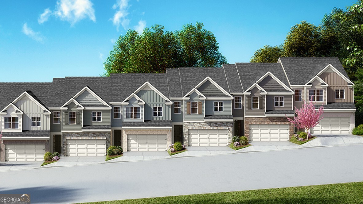 Convenient living 1 minute to Downtown Dahlonega, UNG and just down the street to NE Georgia Medical Center. This end unit home at 70 Rustin Ridge is beautifully tucked away with gorgeous wooded views. This open concept floor plan features a beautiful kitchen outfitted with white granite, soft-close white cabinets, a tiled backsplash and large island--perfect for entertaining. The cozy living room offers an electric fireplace ignited with the simple flip of a switch. Upstairs you'll find a spacious primary suite with a separate shower and soaker tub. Both the primary and hall bathrooms include double vanities and the finishes throughout echo the home's cohesive design palette. A versatile loft provides the perfect space for reading or relaxing. Generously sized secondary bedrooms and a large closet for storage complete the upper level. GA400 is just minutes away and community is surrounded by the award winning North GA mountain wineries. Enjoy nearby shopping, fine dining, horseback riding, hiking trails and breathtaking views. Amenities include a pool, clubhouse and fitness center. Easy strolling sidewalks lead you to your new home at 70 Rustin Ridge.