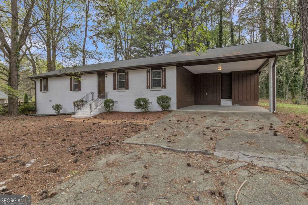 Photo of 5521 E Wind Drive SW, Lilburn, GA 30047 (MLS # 10722047)