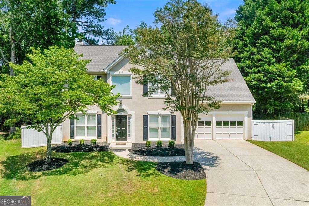 1095 Northpoint Trace beautifully blends subtle 90's charm with modern updates in the heart of Roswell. Built in 1995, this 4-bedroom, 2.5-bath home WAS RECENTLY TAKEN OFF THE MARKET TO UNDERGO MAJOR RENOVATIONS NEW CABINETRY NEW FLOORING THROUGHOUT , AND MORE. The traditional floor plan offers a generous amount of natural light with a spacious dining room, cozy living room with a custom fireplace, and an open flex room ideal for an office, sitting area, or whatever suits your needs. The bright, eat-in kitchen features refreshed finishes with white cabinetry and stainless steel appliances. Upstairs, generous bedrooms include a primary suite with a double vanity, separate shower, and soaking tub. Outside, enjoy the large, level, fenced backyard and freshly updated deck-perfect for entertaining or relaxing. Conveniently located minutes from GA-400, Avalon, North Point Mall, East Roswell Park, Big Creek Park, and top-rated schools. The price reflects the thoughtful upgrades that make this home shine. COME SEE ALL THE UPDATES IN PERSON THIS WEEKEND