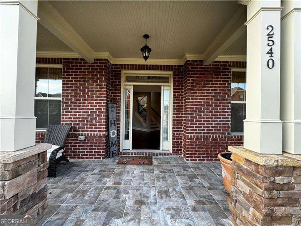 Photo of 2540 Maple Ridge Lane, Cumming, GA 30041 (MLS # 10690892)