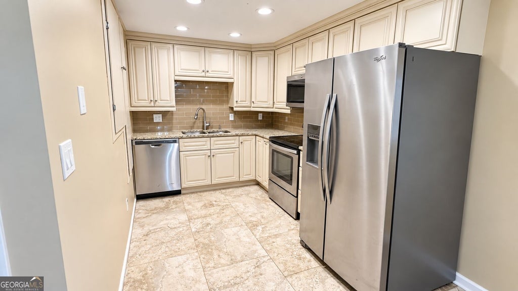 Photo of 5104 Rock Glen Drive, Stone Mountain, GA 30088 (MLS # 10847379)