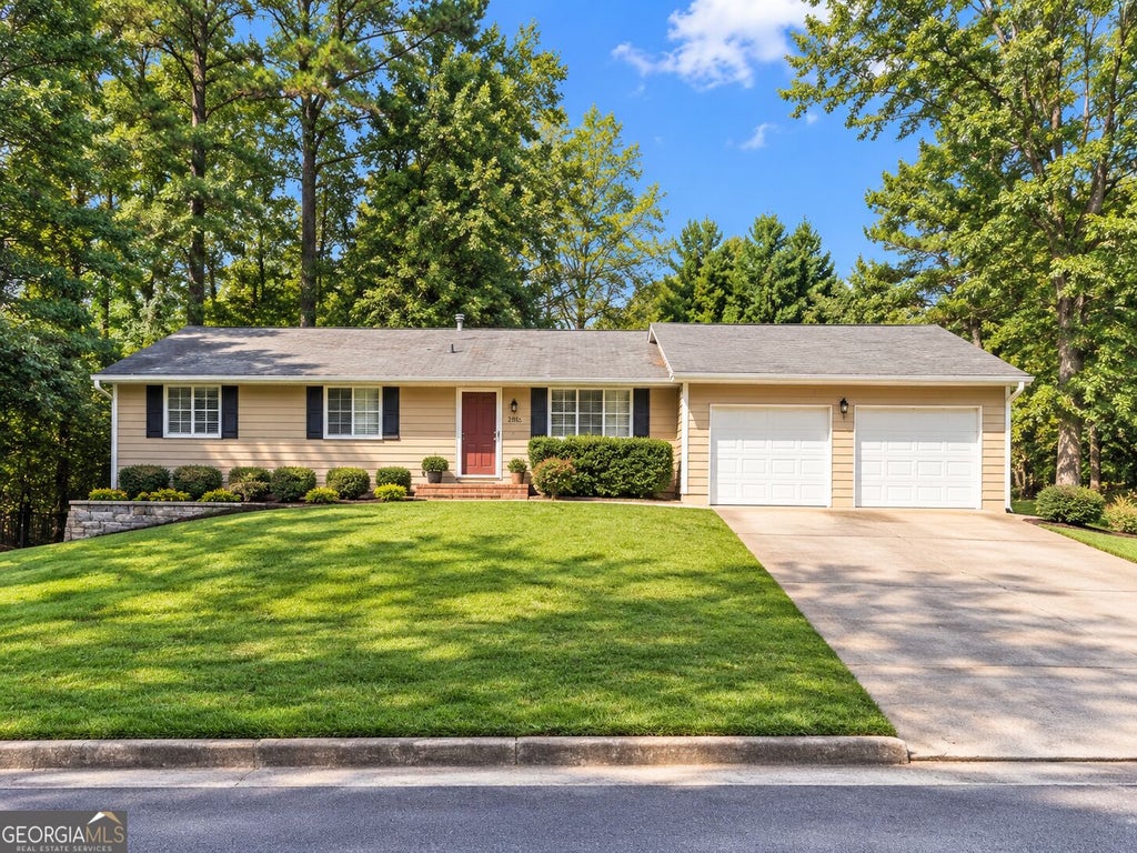 Photo of 5104 Rock Glen Drive, Stone Mountain, GA 30088 (MLS # 10847379)