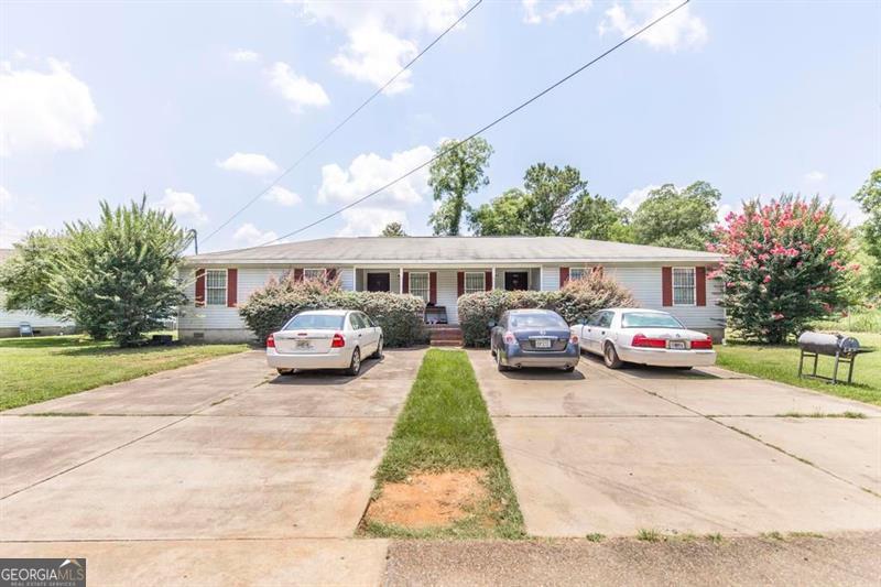 EXCEPTIONAL FULLY RENTED TURNKEY INVESTMENT! Two prime rental buildings: 210 Perry Railroad St & 317 Spruce St. 4 total units with 12BR/8BA total (each unit 3BR/2BA). 100% occupied with reliable, established tenants providing immediate cash flow from closing. Excellent cash flow with strong rental income - see private remarks for details. Prime location near university offers excellent potential for student rentals and ensures consistent demand. Abundant parking spaces - major advantage in competitive rental market. Proven rental history with quality tenant relationships already established. No vacancy risk, no tenant search needed - completely turnkey operation. Multiple revenue streams across two well-positioned properties provide diversified investment risk. University proximity attracts both students and professionals, supporting year-round occupancy. Perfect turnkey opportunity requiring zero initial work for seasoned investors or those entering rental market. Immediate income generation with strong potential for future appreciation. Rare find combining full occupancy, ample parking, student rental potential, and completely turnkey operation. Won't last long!!!Schedule your showing today!!!