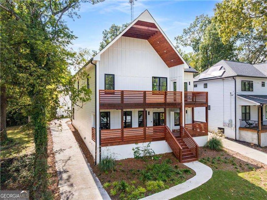 4 bedroom Main Residence + 1 Bedroom attached apartment + Detached 2 bedroom apartment! Experience the perfect blend of upscale living and smart investment in this stunning new construction home, ideally situated on a quiet dead-end street in Atlanta's highly desirable Upper Westside. Just minutes from The Works, Interlock, Westside Reservoir Park, and Mercedes-Benz Stadium, this location offers a rare combination of peaceful privacy and unbeatable city access. The main residence is thoughtfully designed for both everyday living and effortless entertaining. At the heart of the home is a chef's dream kitchen featuring stainless steel appliances, an expansive island, generous counter space, and a walk-in pantry-all seamlessly flowing into a spacious open-concept living and dining area. Enjoy outdoor living with a covered front patio deck, perfect for morning coffee or evening gatherings. Upstairs, the oversized primary suite is a true retreat with a custom walk-in closet, a spa-inspired ensuite with soaking tub, and a private covered balcony. Additional bedrooms are generously sized and complemented by beautifully tiled bathrooms. Expanding the home's versatility, an attached in-law suite offers a private 1-bedroom, 1-bath layout complete with a full kitchen and living area-ideal for guests, extended family, au pair, or short/long-term rental income. To further maximize potential, a detached carriage house at the rear of the property features a 2-bedroom, 2-bathroom unit with its own kitchen-an excellent opportunity for generating rental income or accommodating additional family members, home office, studio or more! Located within the sought-after Bolton Academy, Sutton Middle, and North Atlanta High school districts, this one-of-a-kind property is perfect for families, investors, or multi-generational living.